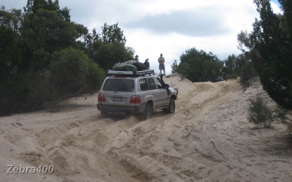 18-Some of the convoy watch Snapper enjoy the sand.JPG